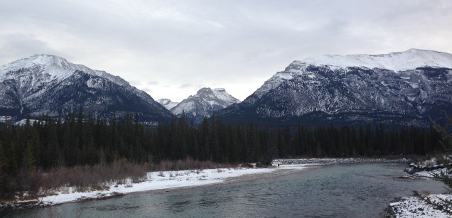 Mount Macdonald to the left and Grotto Mountain on the right, with the Bow River in the foreground.